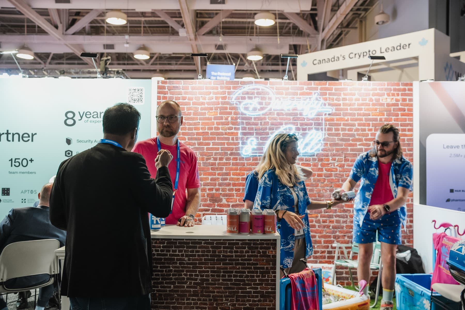 Visitors at the Reserve booth counter during Consensus